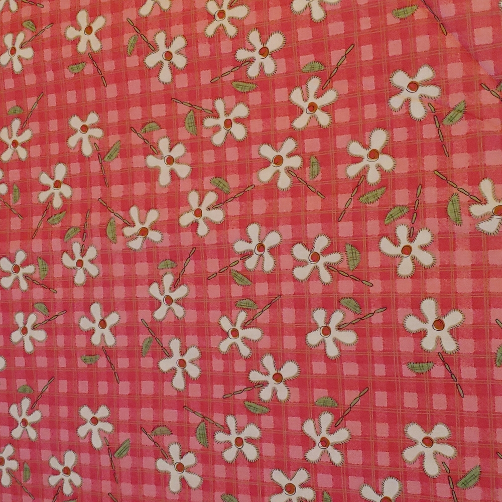 Quick as a Wink quilting fabric with flowers and checks